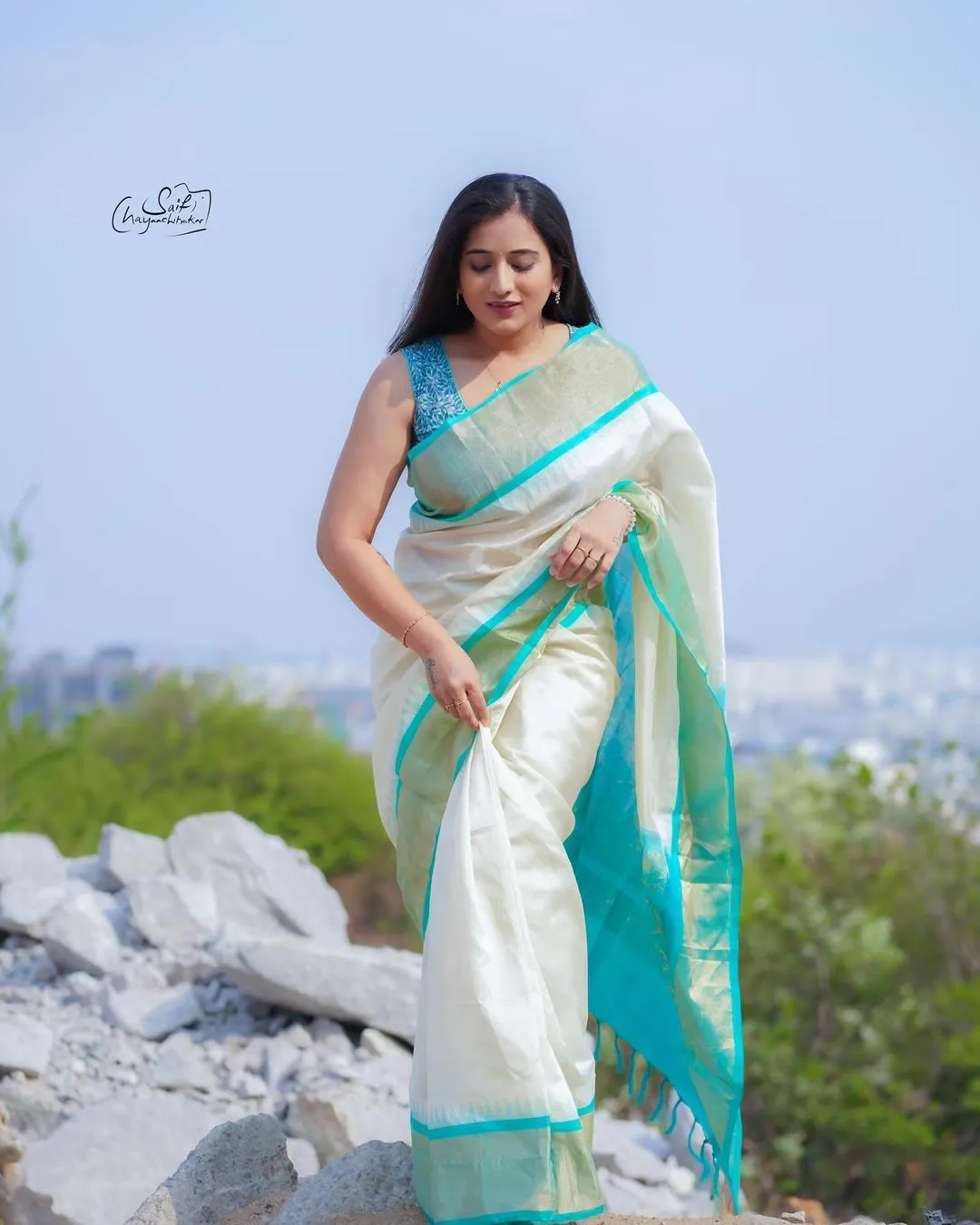 Beautiful Indian Actress Virajitha Stills in White Saree